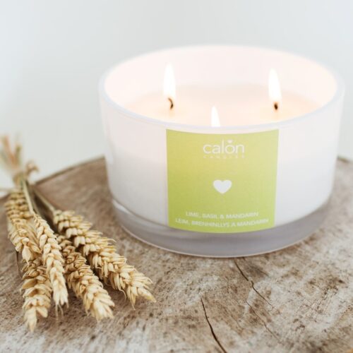 A large Lime, Basil and Mandarin three-wick candle scented candle from Welsh candle company, Calon Home.