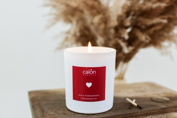 A Black Pomegranate candle scented candle from Welsh candle company, Calon Home