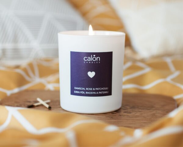 A damson, rose and patchouli candle scented candle from Welsh candle company, Calon Home