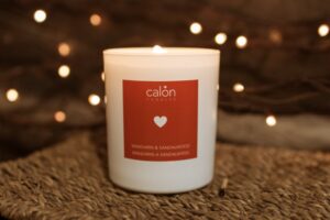 A Mandarin & Sandalwood candle scented candle from Welsh candle company, Calon Home