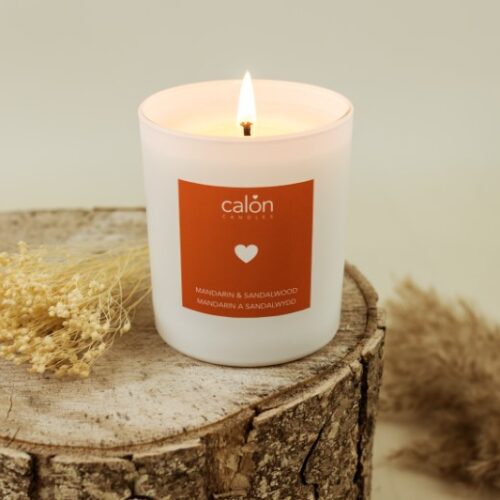 A Mandarin & Sandalwood candle scented candle from Welsh candle company, Calon Home