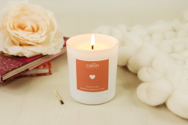 A Peony and Oud candle scented candle from Welsh candle company, Calon Home