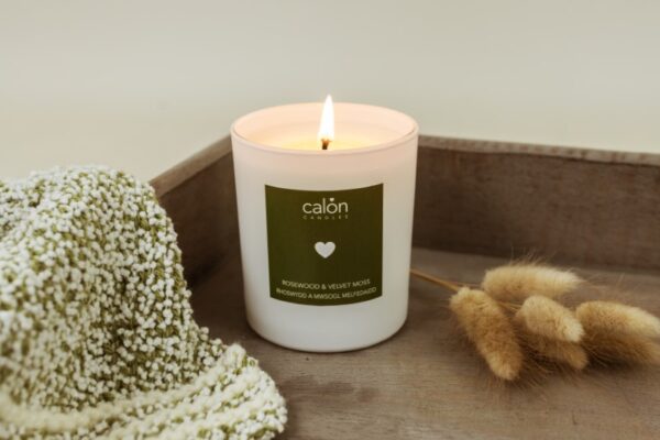 An earthy Rosewood & Velvet Moss candle scented candle from Welsh candle company, Calon Home