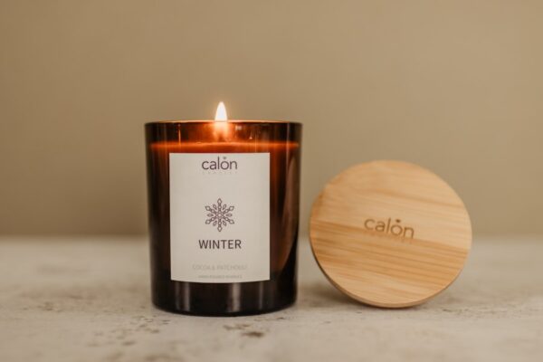 cocoa and patchouli amber glass candle