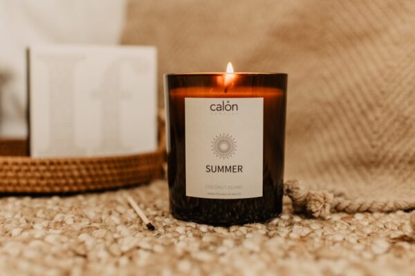 Coconut island summer candle with matches in background