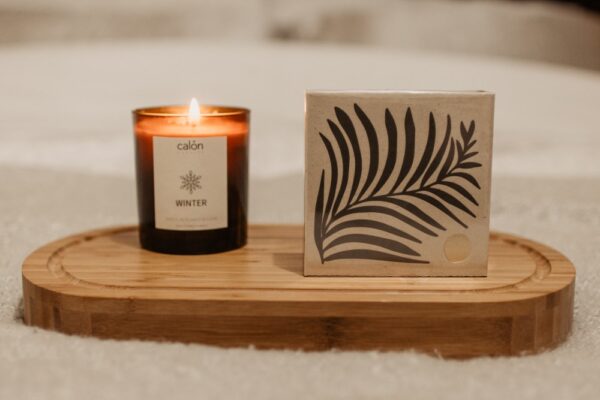 Fern matchbox with amber glass candle