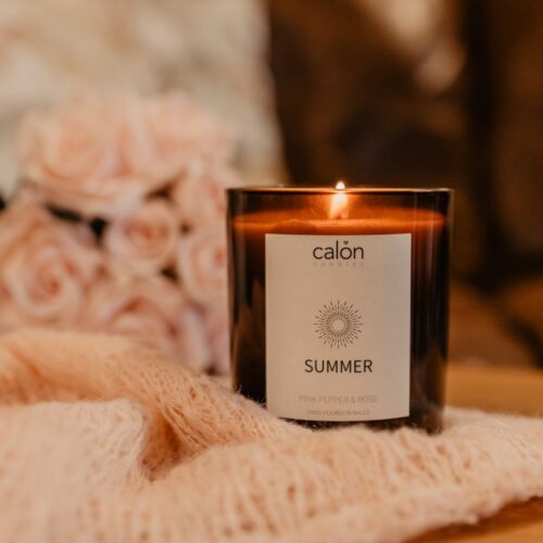 Pink Pepper and Rose summer candle with roses - lifestyle