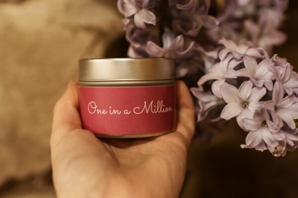 one in a million bilingual mini tin candle pink