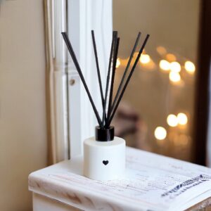 calon home candle co reed diffuser on window-sill